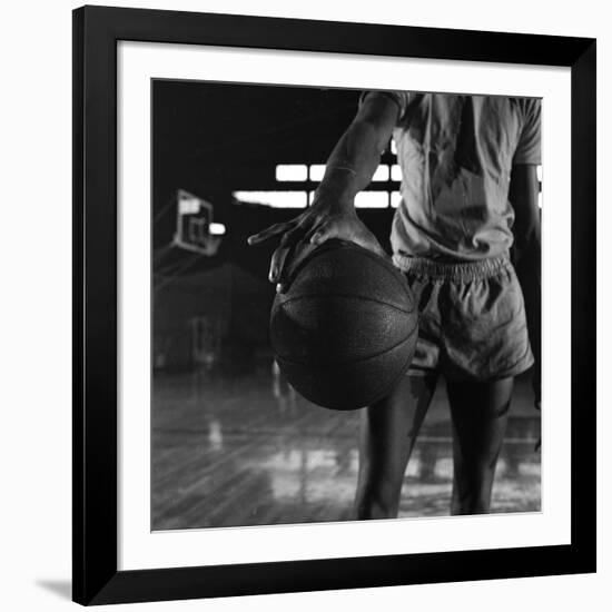 Basketball Held by Player Wilt Chamberlain, 1956-Frank Scherschel-Framed Photographic Print