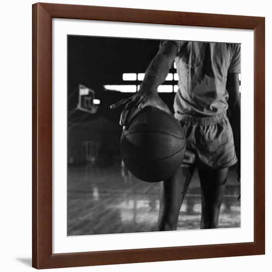 Basketball Held by Player Wilt Chamberlain, 1956-Frank Scherschel-Framed Photographic Print