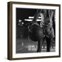 Basketball Held by Player Wilt Chamberlain, 1956-Frank Scherschel-Framed Photographic Print