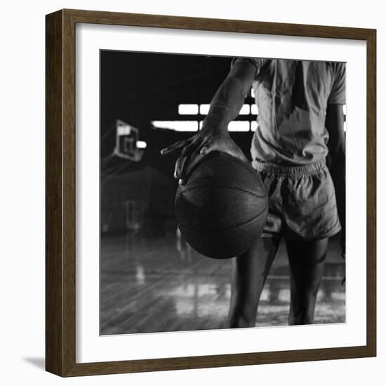 Basketball Held by Player Wilt Chamberlain, 1956-Frank Scherschel-Framed Photographic Print