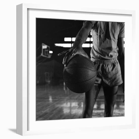 Basketball Held by Player Wilt Chamberlain, 1956-Frank Scherschel-Framed Photographic Print