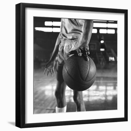 Basketball Held by Player Wilt Chamberlain, 1956-Frank Scherschel-Framed Premium Photographic Print