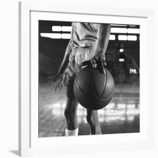 Basketball Held by Player Wilt Chamberlain, 1956-Frank Scherschel-Framed Photographic Print