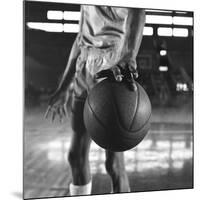 Basketball Held by Player Wilt Chamberlain, 1956-Frank Scherschel-Mounted Photographic Print