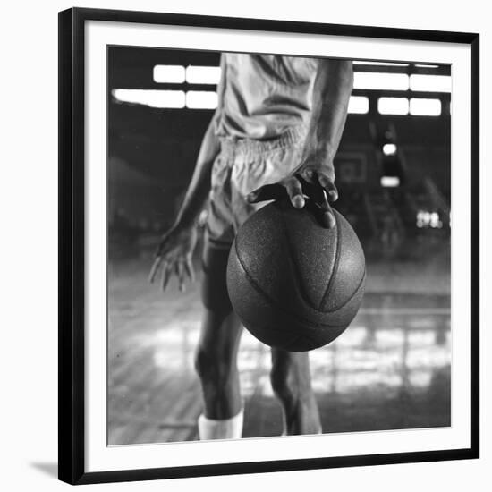 Basketball Held by Player Wilt Chamberlain, 1956-Frank Scherschel-Framed Premium Photographic Print