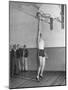 Basketball Player Max Palmer Reaching Up to Drop Basketball into Basket-null-Mounted Photographic Print