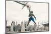 Basketball Player Performing Slum Dunk on a Street Court. Background with Manhattan Buildings-Oneinchpunch-Mounted Photographic Print