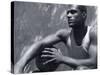 Basketball Player Resting-null-Stretched Canvas