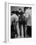 Basketball Player Tom Gola in a Huddle During a Basketball Game-null-Framed Photographic Print