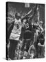 Basketball Players Bill Russell and Wilt Chamberlain During Game-George Silk-Stretched Canvas