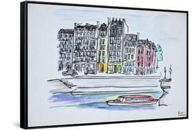 Bateaux mouche boat travels along the Seine river, Ile Saint-Louis, Paris, France-Richard Lawrence-Framed Stretched Canvas