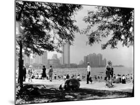 Bathers and Strollers Enjoying a Fine Day at Oak Street Beach-null-Mounted Photographic Print