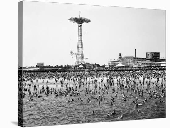 Bathers Enjoying Coney Island Beaches. Parachute Ride and Steeplechase Park Visible in the Rear-Margaret Bourke-White-Stretched Canvas