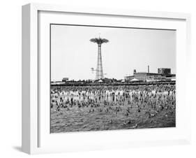 Bathers Enjoying Coney Island Beaches. Parachute Ride and Steeplechase Park Visible in the Rear-Margaret Bourke-White-Framed Photographic Print