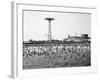 Bathers Enjoying Coney Island Beaches. Parachute Ride and Steeplechase Park Visible in the Rear-Margaret Bourke-White-Framed Photographic Print