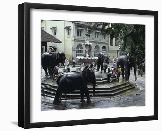Bathing Elephants in Fountain, Kandy, Sri Lanka-Alain Evrard-Framed Photographic Print