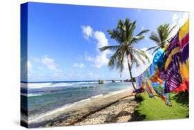 Bathsheba, colourful garments blow in the breeze, windswept palm trees, Barbados-Eleanor Scriven-Stretched Canvas