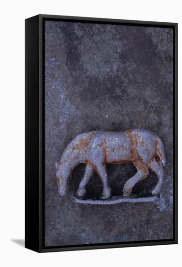 Battered Lead Model of Grazing Horse Lying on Tarnished Metal-Den Reader-Framed Stretched Canvas