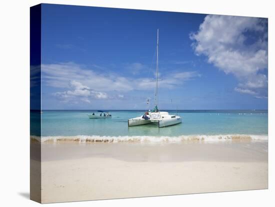 Bay Islands, Roatan, West Bay, Man Reading Book on Catamaran, Honduras-Jane Sweeney-Stretched Canvas