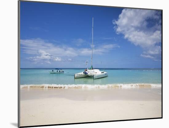 Bay Islands, Roatan, West Bay, Man Reading Book on Catamaran, Honduras-Jane Sweeney-Mounted Photographic Print