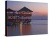 Bay Islands, Roatan, West End, Fosters Bar and Restaurant at Sunset, Honduras-Jane Sweeney-Stretched Canvas