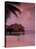 Beach and Water Villas at Sunset, Maldive Islands, Indian Ocean-Calum Stirling-Stretched Canvas
