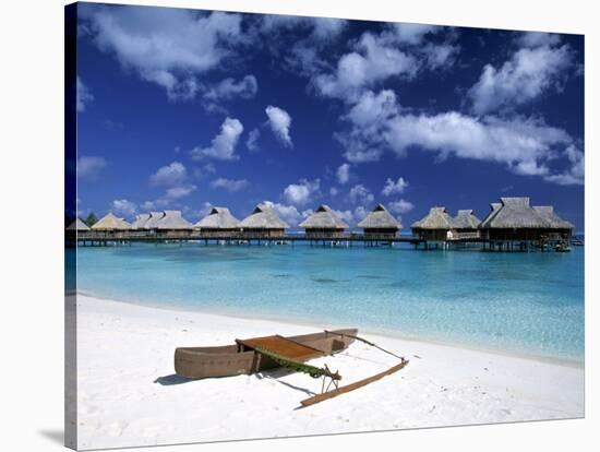 Beach at Bora Bora Nui Resort, Bora Bora, French Polynesia-Walter Bibikow-Stretched Canvas