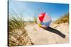 Beach Ball Resting in Sand Dune Concept for Childhood Summer Vacations, Family Holiday and Healthy-Flynt-Stretched Canvas