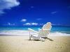 Beach Chair on Empty Beach-Randy Faris-Stretched Canvas