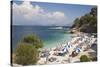 Beach Crowded with Holidaymakers, Kassiopi, Corfu, Ionian Islands, Greek Islands, Greece, Europe-Ruth Tomlinson-Stretched Canvas