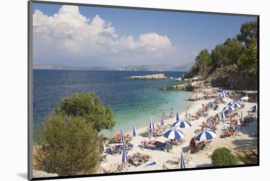 Beach Crowded with Holidaymakers, Kassiopi, Corfu, Ionian Islands, Greek Islands, Greece, Europe-Ruth Tomlinson-Mounted Photographic Print