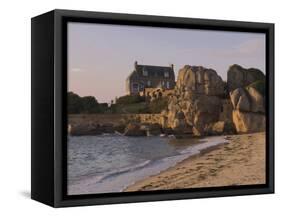 Beach House Built Behind Rocks, Tregastel, Cote De Granit Rose, Cotes d'Armor, Brittany, France-David Hughes-Framed Stretched Canvas