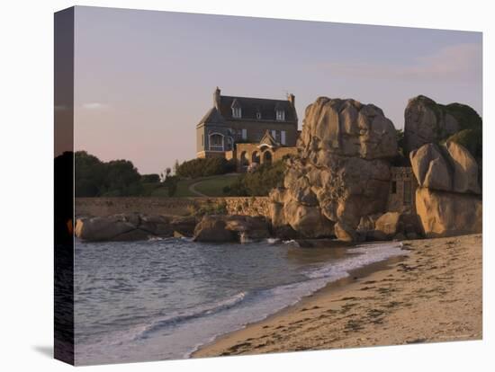 Beach House Built Behind Rocks, Tregastel, Cote De Granit Rose, Cotes d'Armor, Brittany, France-David Hughes-Stretched Canvas