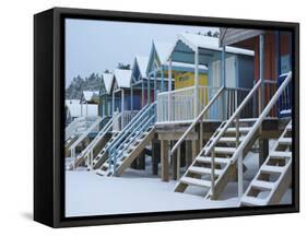 Beach Huts in the Snow at Wells Next the Sea, Norfolk, England-Jon Gibbs-Framed Stretched Canvas