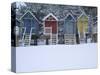 Beach Huts in the Snow at Wells Next the Sea, Norfolk, England-Jon Gibbs-Stretched Canvas