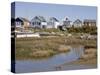 Beach Huts on Mudeford Spit or Sandbank, Christchurch Harbour, Dorset, England, United Kingdom-Rainford Roy-Stretched Canvas