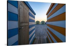 Beach Huts on the Pier-Linda Wride-Stretched Canvas