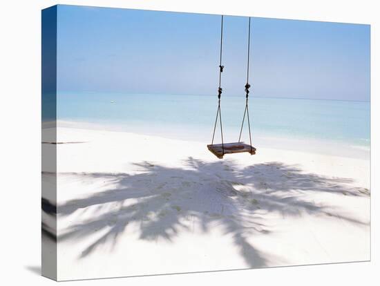 Beach Swing And Shadow of Palm Tree on Sand-null-Stretched Canvas