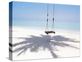 Beach Swing And Shadow of Palm Tree on Sand-null-Stretched Canvas