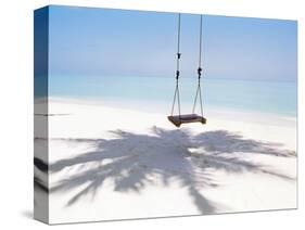 Beach Swing And Shadow of Palm Tree on Sand-null-Stretched Canvas