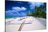 Beach Umbrellas and Outrigger Canoe-George Oze-Stretched Canvas