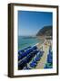 Beach umbrellas lining the beach in Monterosso al Mare, Cinque Terre, Italy.-Michael DeFreitas-Framed Photographic Print