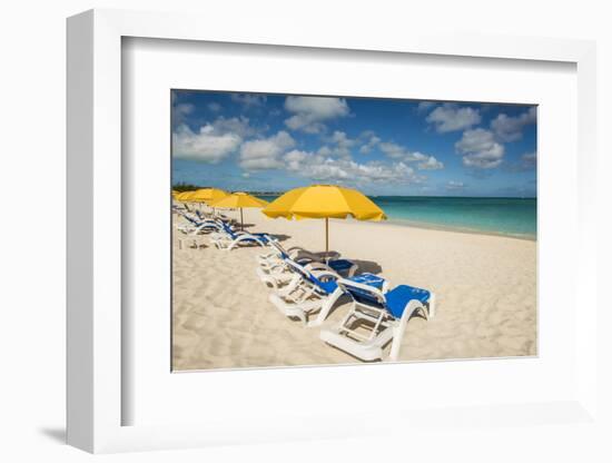 Beach umbrellas on Grace Bay Beach, Providenciales, Turks and Caicos Islands, Caribbean.-Michael DeFreitas-Framed Photographic Print