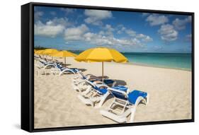 Beach umbrellas on Grace Bay Beach, Providenciales, Turks and Caicos Islands, Caribbean.-Michael DeFreitas-Framed Stretched Canvas