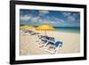 Beach umbrellas on Grace Bay Beach, Providenciales, Turks and Caicos Islands, Caribbean.-Michael DeFreitas-Framed Photographic Print