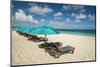 Beach umbrellas on Grace Bay Beach, Providenciales, Turks and Caicos Islands, Caribbean.-Michael DeFreitas-Mounted Photographic Print