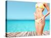 Beach, Vacation, Summer Holidays and Body Concept - Closeup of Female Body in Bikini at Beach-dolgachov-Stretched Canvas