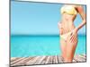 Beach, Vacation, Summer Holidays and Body Concept - Closeup of Female Body in Bikini at Beach-dolgachov-Mounted Photographic Print