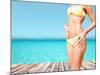 Beach, Vacation, Summer Holidays and Body Concept - Closeup of Female Body in Bikini at Beach-dolgachov-Mounted Photographic Print