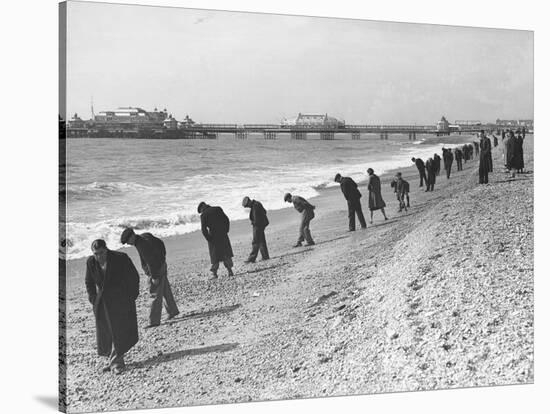 Beachcombers Searching Brighton Beach for Treasure-null-Stretched Canvas